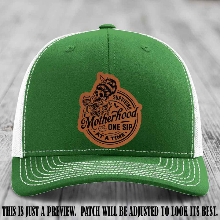 Surviving Motherhood One Sip at a Time Rawhide to Black Patch on Richardson 112 Hat - Kelly to White Hat
