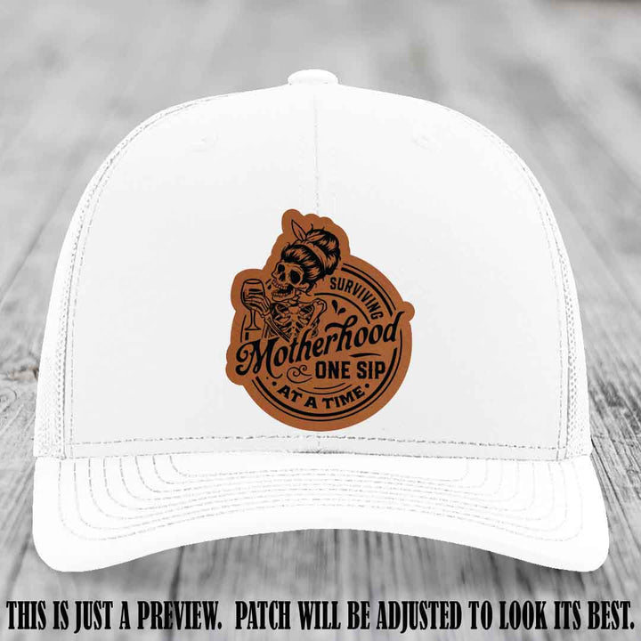 Surviving Motherhood One Sip at a Time Rawhide to Black Patch on Richardson 112 Hat - White Hat