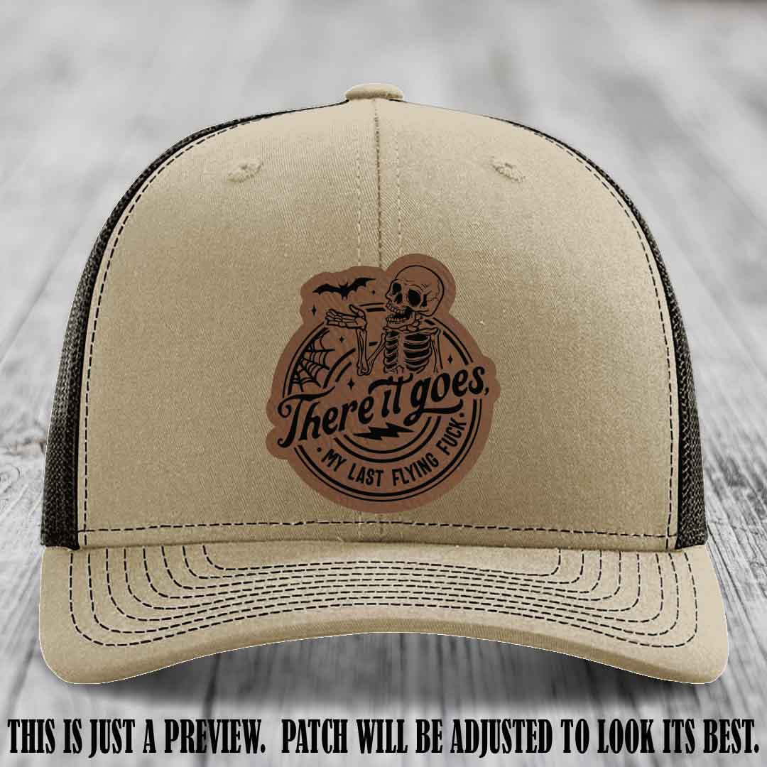 There It Goes design on Dark Brown to Black Patch, displayed on a Khaki to Coffee Hat, funny Richardson 112 leather patch hat