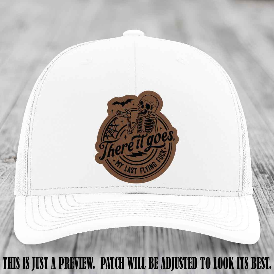 There It Goes design on Dark Brown to Black Patch, displayed on a White Hat, funny Richardson 112 leather patch hat