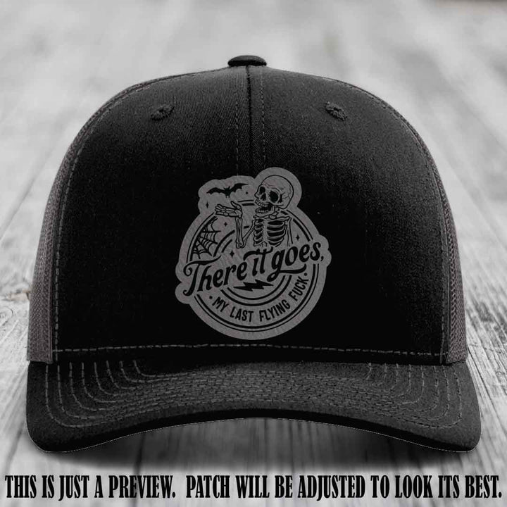 There It Goes design on Grey to Black Patch, displayed on a Black to Charcoal Hat, funny Richardson 112 leather patch hat