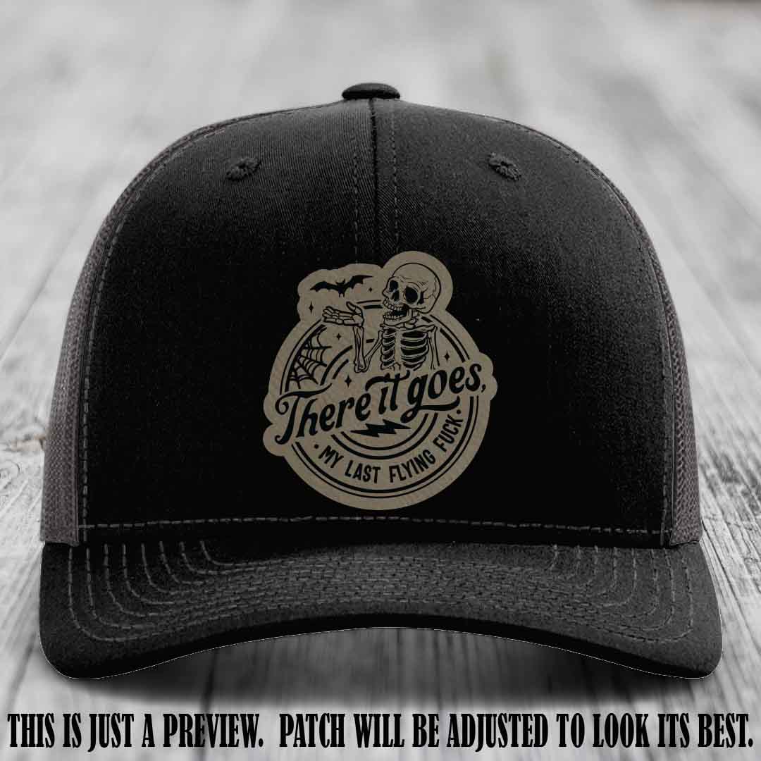 There It Goes design on Light Brown to Black Patch, displayed on a Black to Charcoal Hat, funny Richardson 112 leather patch hat