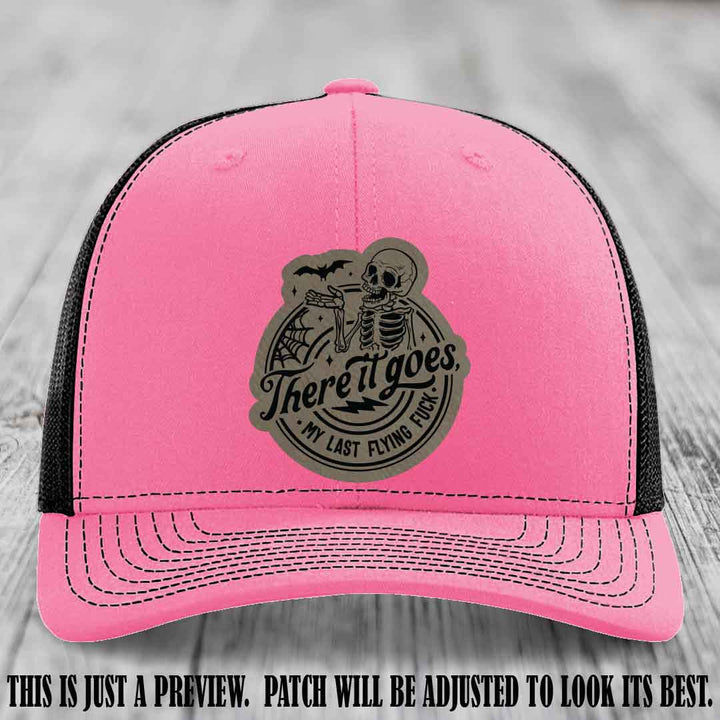 There It Goes design on Light Brown to Black Patch, displayed on a Hot Pink to Black Hat, funny Richardson 112 leather patch hat
