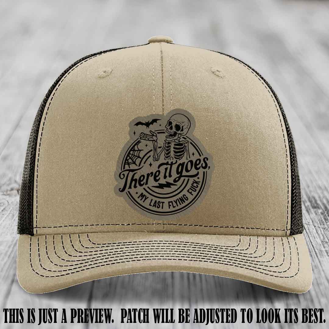 There It Goes design on Light Brown to Black Patch, displayed on a Khaki to Coffee Hat, funny Richardson 112 leather patch hat
