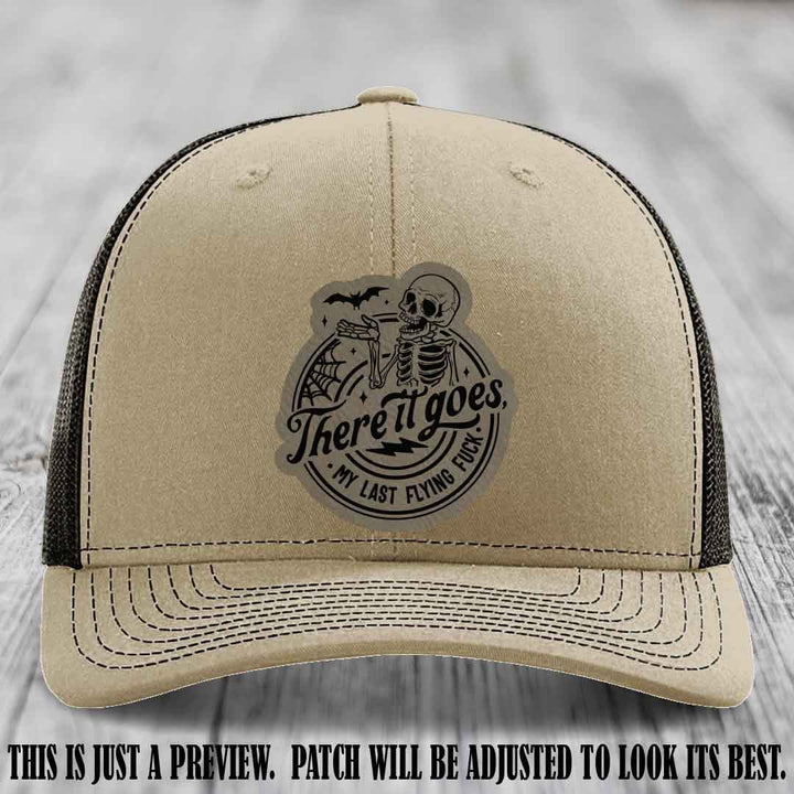 There It Goes design on Light Brown to Black Patch, displayed on a Khaki to Coffee Hat, funny Richardson 112 leather patch hat
