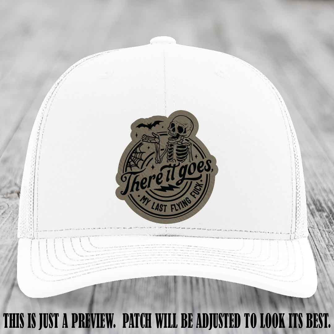 There It Goes design on Light Brown to Black Patch, displayed on a White Hat, funny Richardson 112 leather patch hat