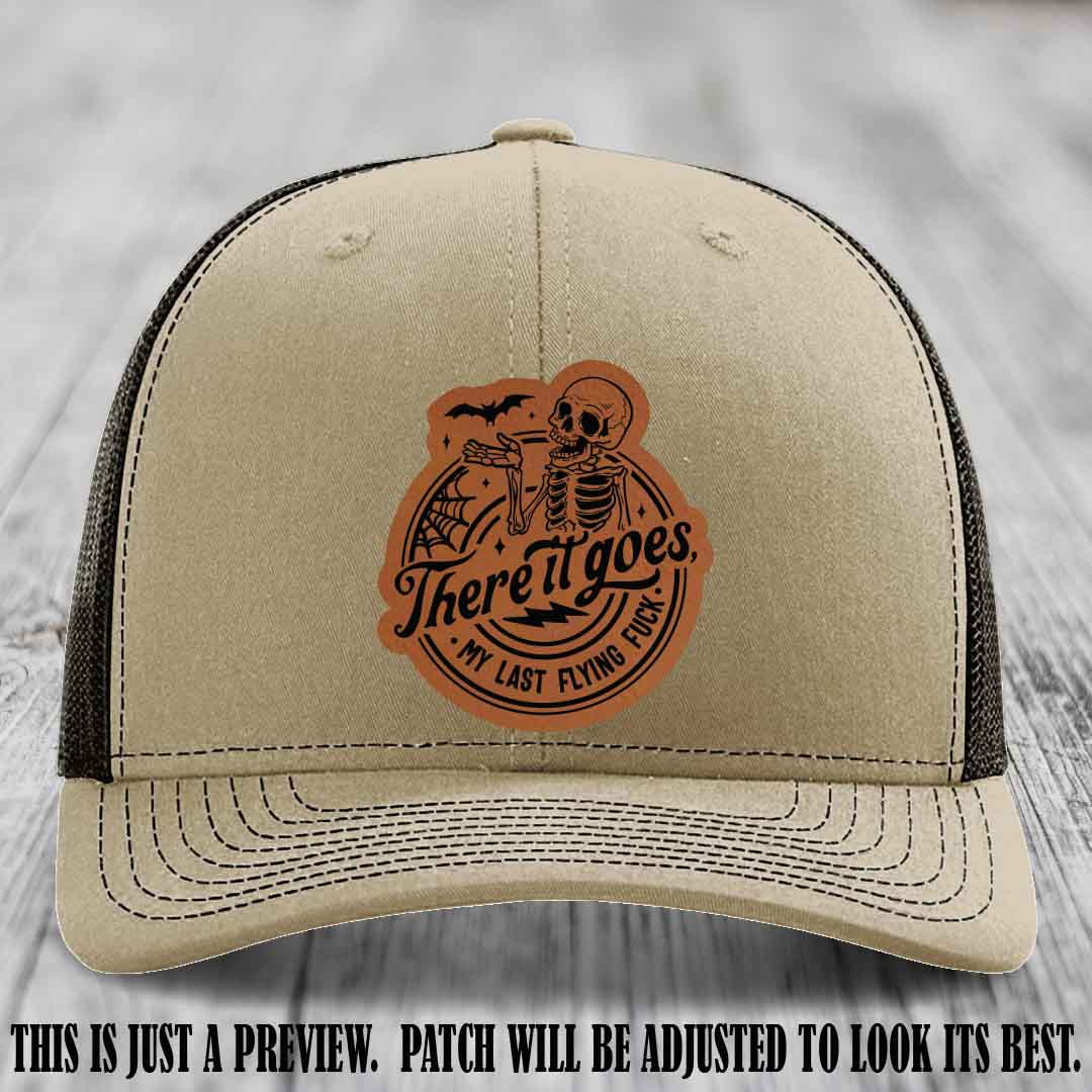 There It Goes design on Rawhide to Black Patch, displayed on a Khaki to Coffee Hat, funny Richardson 112 leather patch hat