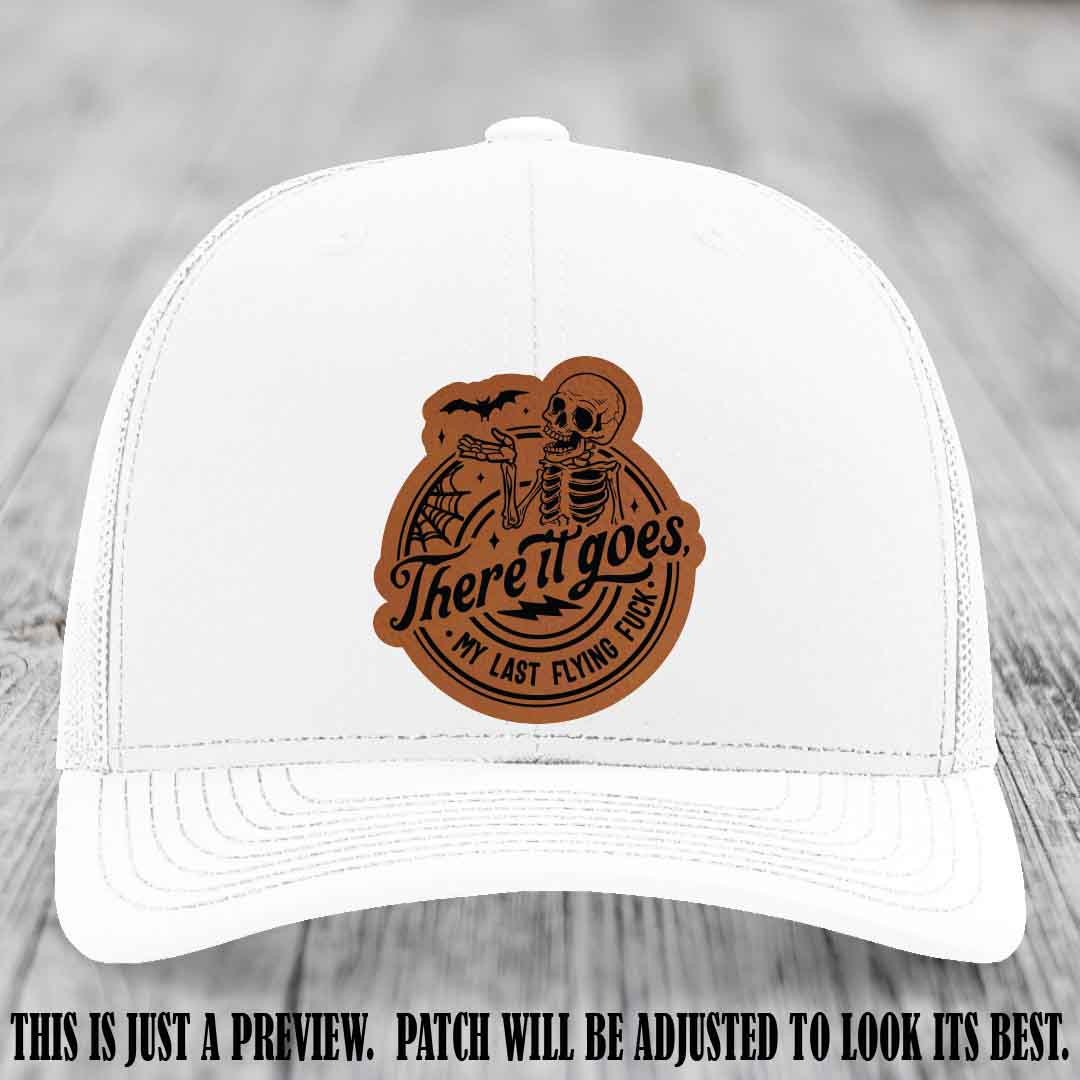 There It Goes design on Rawhide to Black Patch, displayed on a White Hat, funny Richardson 112 leather patch hat