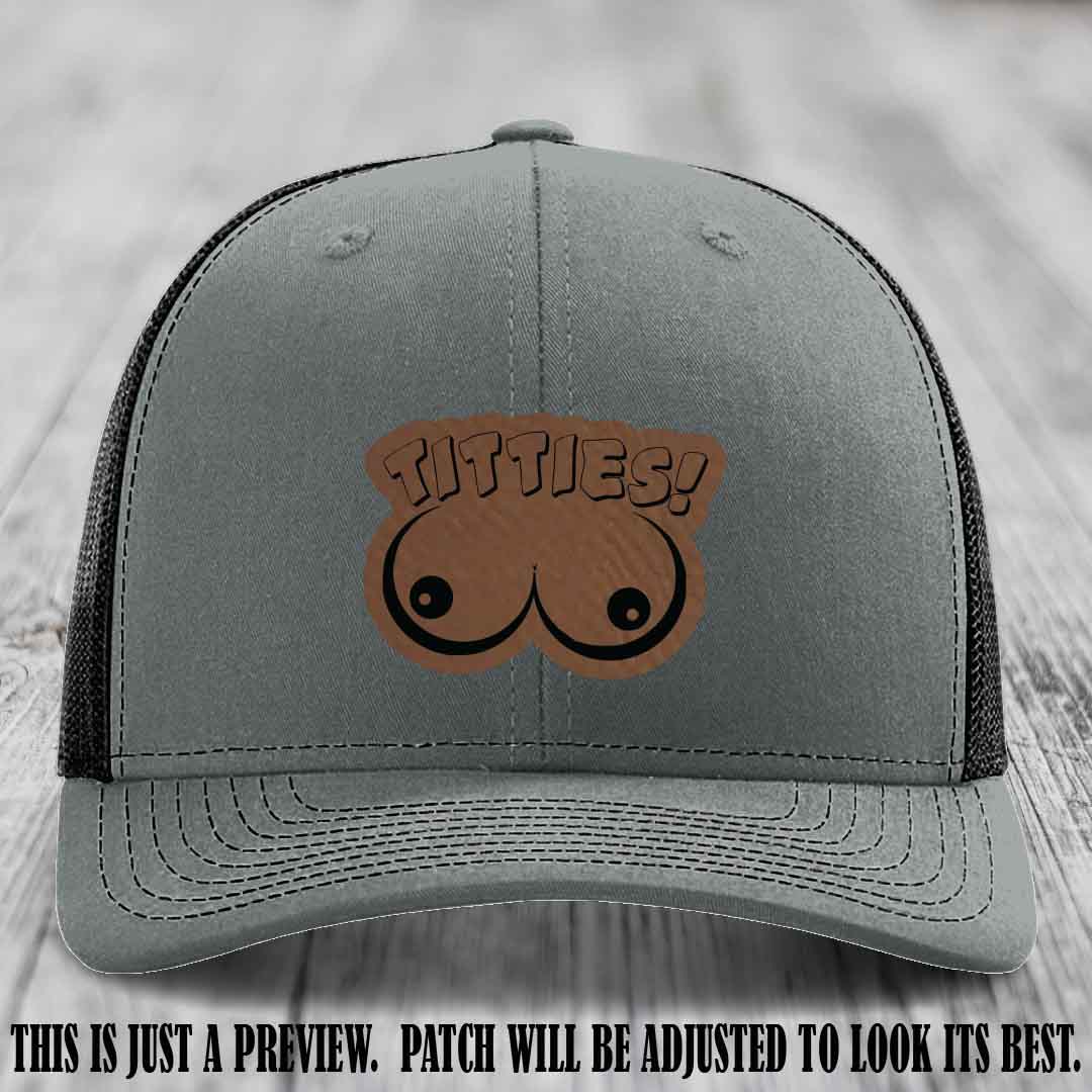 TITTIES! leather patch on Dark Brown to Black Patch mounted on a Heather Grey to Black Hat – Richardson 112 funny trucker hat