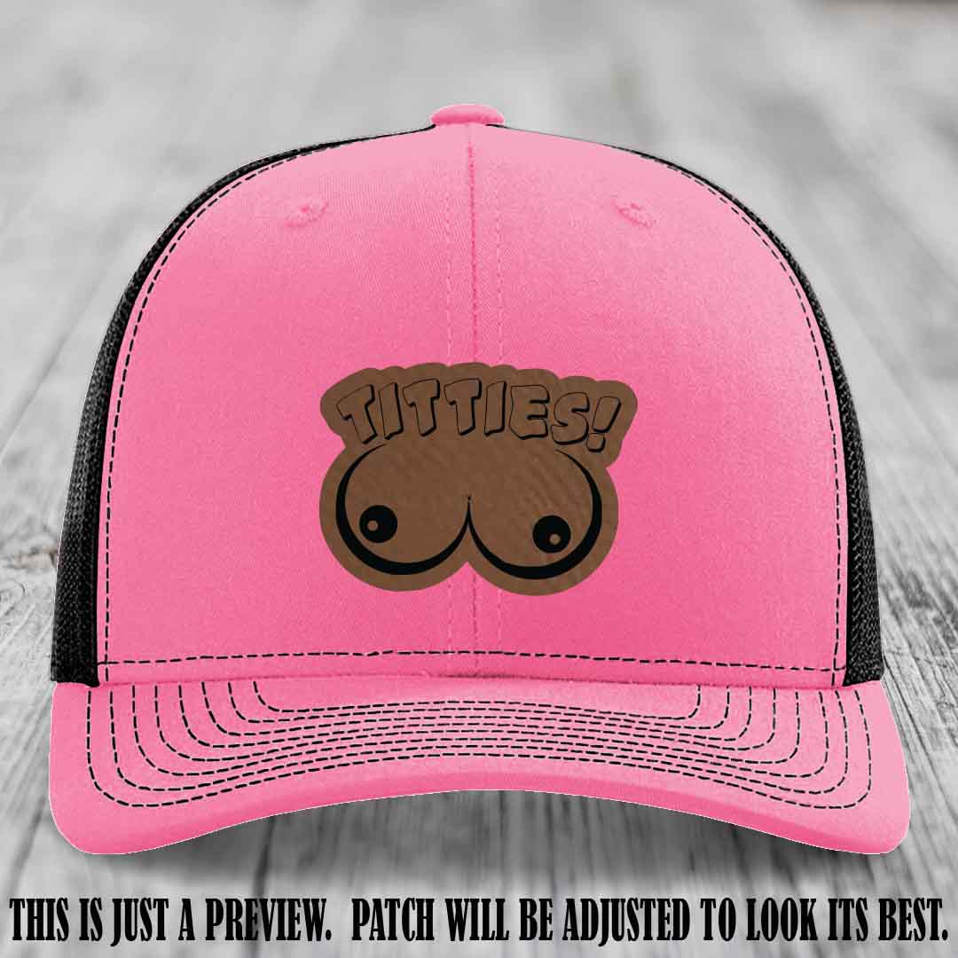 TITTIES! leather patch on Dark Brown to Black Patch mounted on a Hot Pink to Black Hat – Richardson 112 funny trucker hat