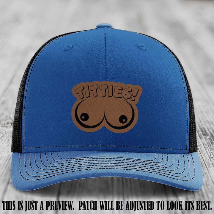 TITTIES! leather patch on Dark Brown to Black Patch mounted on a Royal to Black Hat – Richardson 112 funny trucker hat