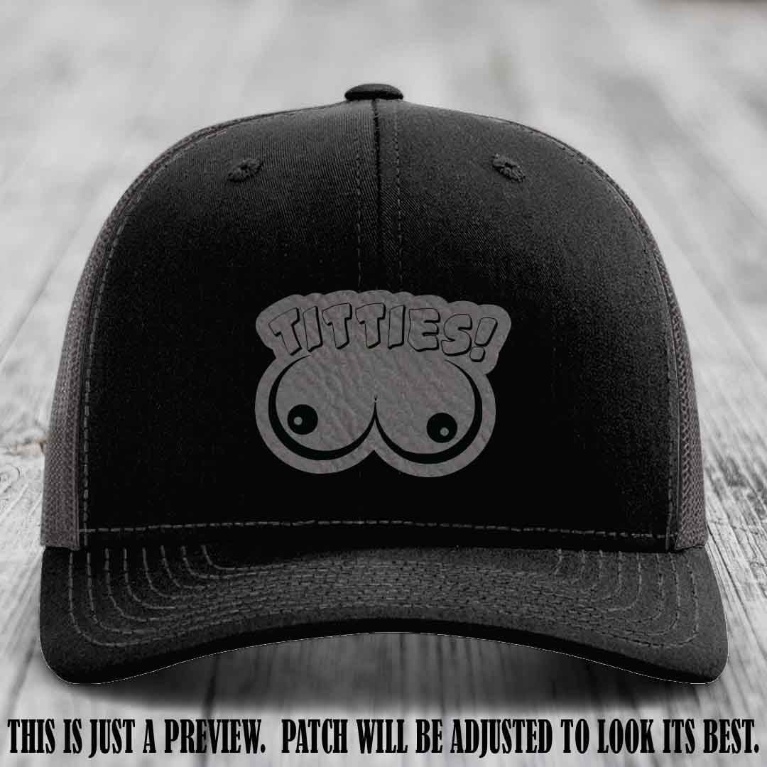 TITTIES! leather patch on Grey to Black Patch mounted on a Black to Charcoal Hat – Richardson 112 funny trucker hat