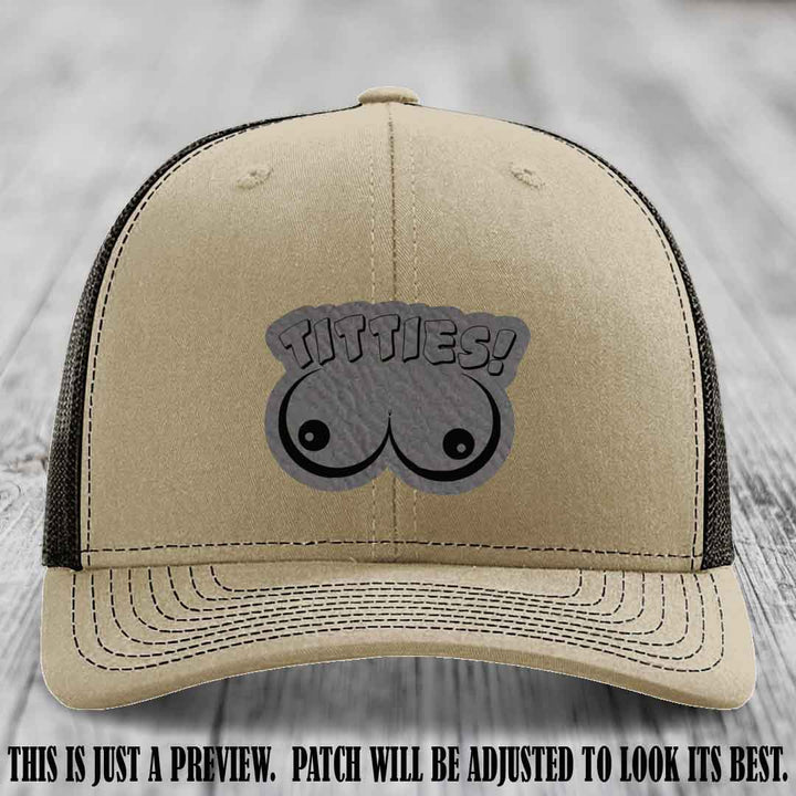 TITTIES! leather patch on Grey to Black Patch mounted on a Khaki to Coffee Hat – Richardson 112 funny trucker hat