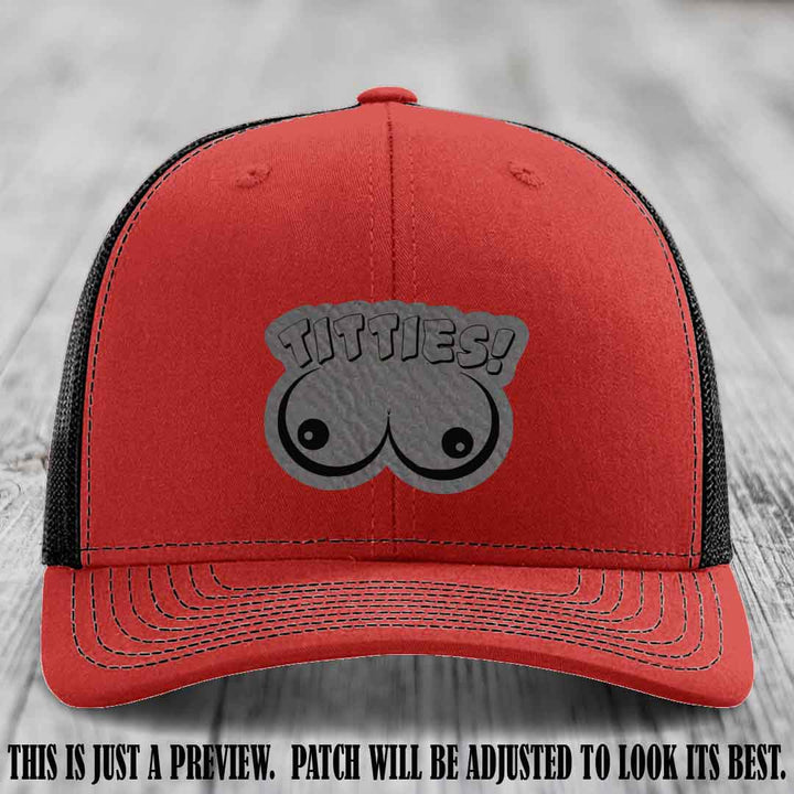 TITTIES! leather patch on Grey to Black Patch mounted on a Red to Black Hat – Richardson 112 funny trucker hat