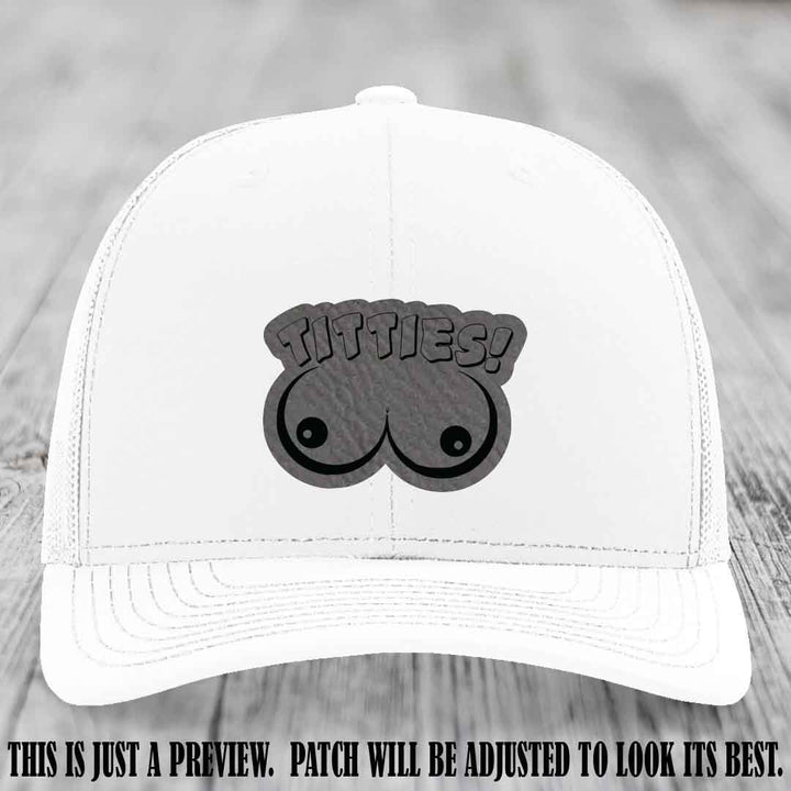 TITTIES! leather patch on Grey to Black Patch mounted on a White Hat – Richardson 112 funny trucker hat