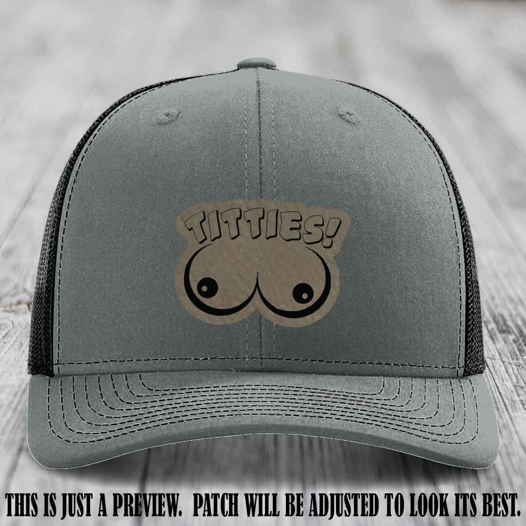 TITTIES! leather patch on Light Brown to Black Patch mounted on a Heather Grey to Black Hat – Richardson 112 funny trucker hat