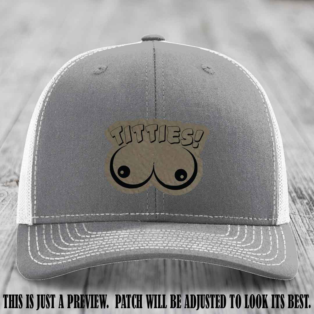 TITTIES! leather patch on Light Brown to Black Patch mounted on a Heather Grey to White Hat – Richardson 112 funny trucker hat