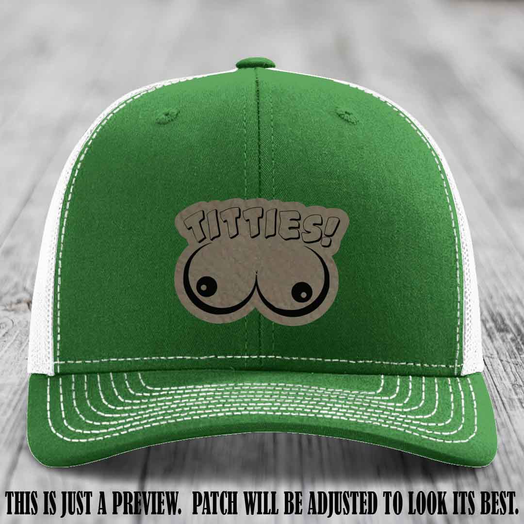 TITTIES! leather patch on Light Brown to Black Patch mounted on a Kelly to White Hat – Richardson 112 funny trucker hat