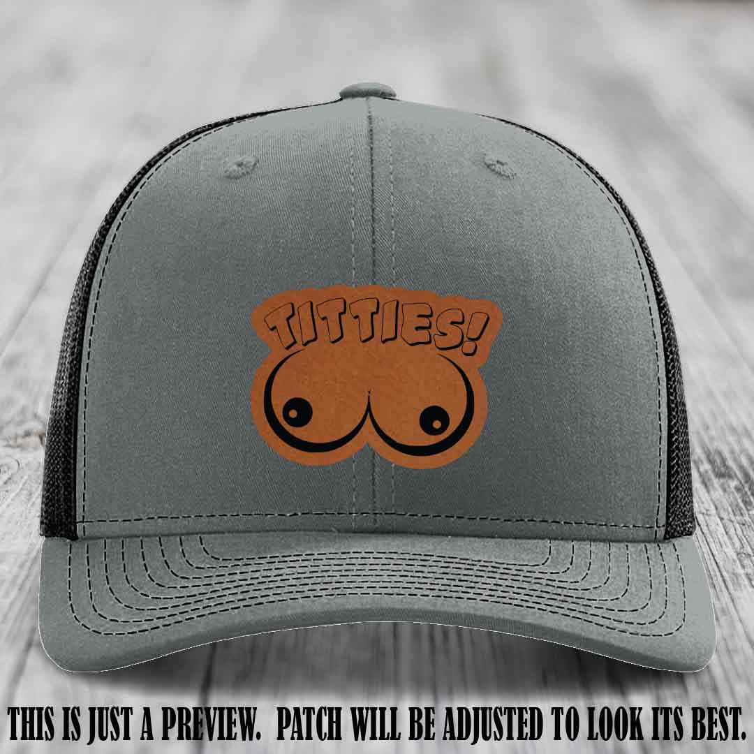 TITTIES! leather patch on Rawhide to Black Patch mounted on a Heather Grey to Black Hat – Richardson 112 funny trucker hat