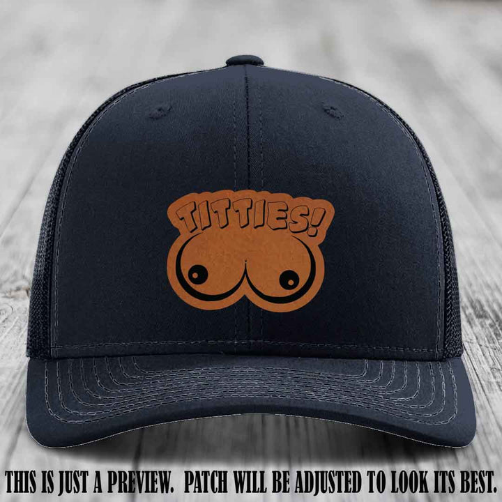 TITTIES! leather patch on Rawhide to Black Patch mounted on a Navy Hat – Richardson 112 funny trucker hat