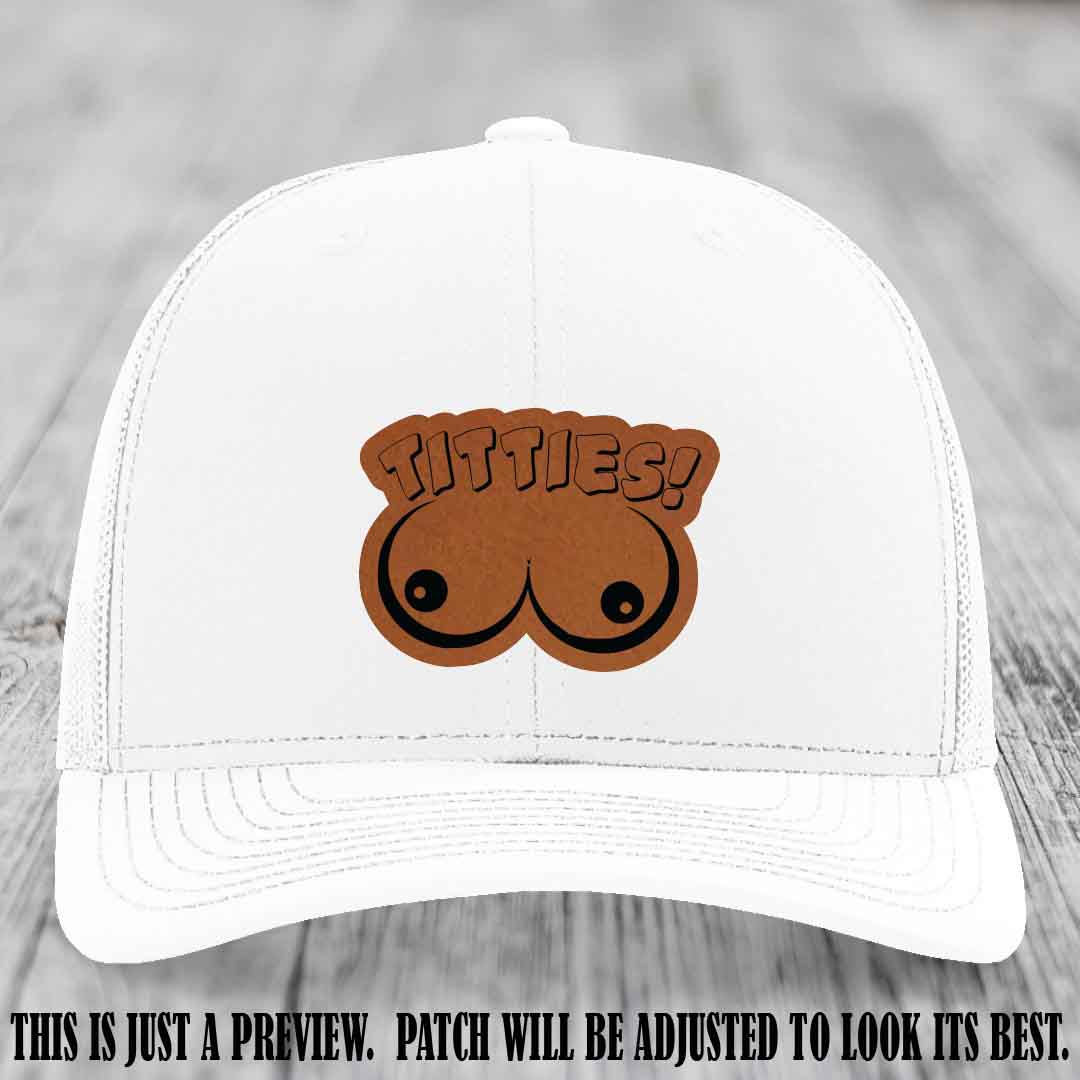 TITTIES! leather patch on Rawhide to Black Patch mounted on a White Hat – Richardson 112 funny trucker hat