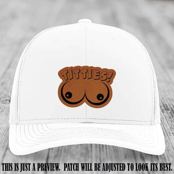 TITTIES! leather patch on Rawhide to Black Patch mounted on a White Hat – Richardson 112 funny trucker hat