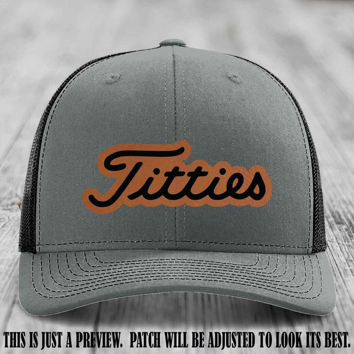Titties patch design on Rawhide to Black Patch on Heather Grey to Black Hat