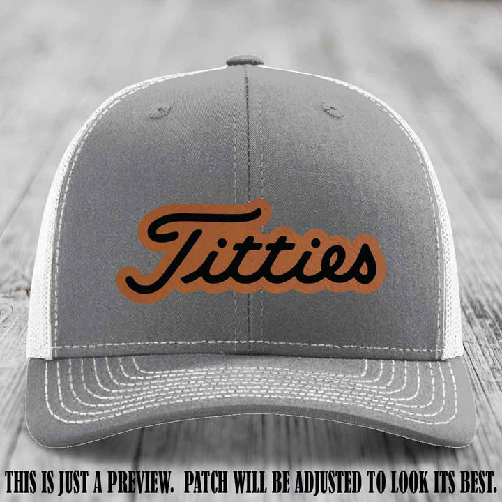 Titties patch design on Rawhide to Black Patch on Heather Grey to White Hat