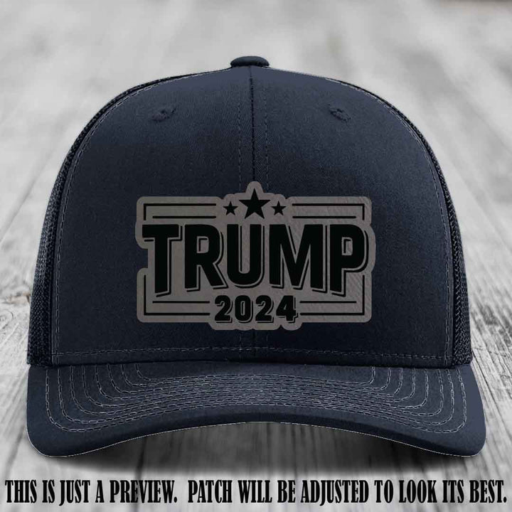 TRUMP 2024 leather patch on Richardson 112 Navy Hat with Grey to Black Patch