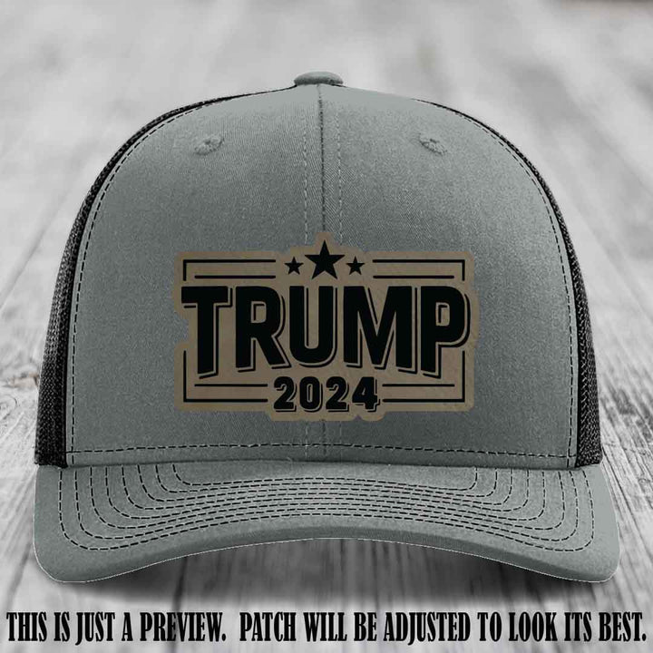 TRUMP 2024 leather patch on Richardson 112 Heather Grey to Black Hat with Light Brown to Black Patch
