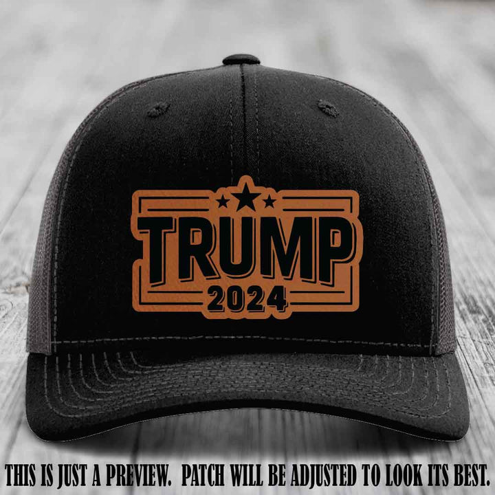 TRUMP 2024 leather patch on Richardson 112 Black to Charcoal Hat with Rawhide to Black Patch