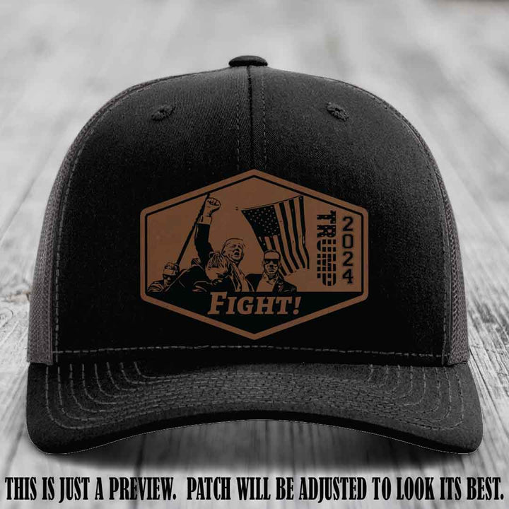 Fight Night Trump 2024 design on a Richardson 112 Black to Charcoal Hat with a Dark Brown to Black Patch leather patch