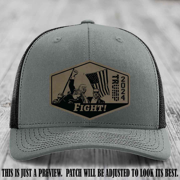 Fight Night Trump 2024 design on a Richardson 112 Heather Grey to Black Hat with a Light Brown to Black Patch leather patch