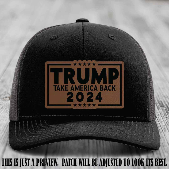 Trump Take America Back 2024 on a Black to Charcoal Hat with Dark Brown to Black Patch