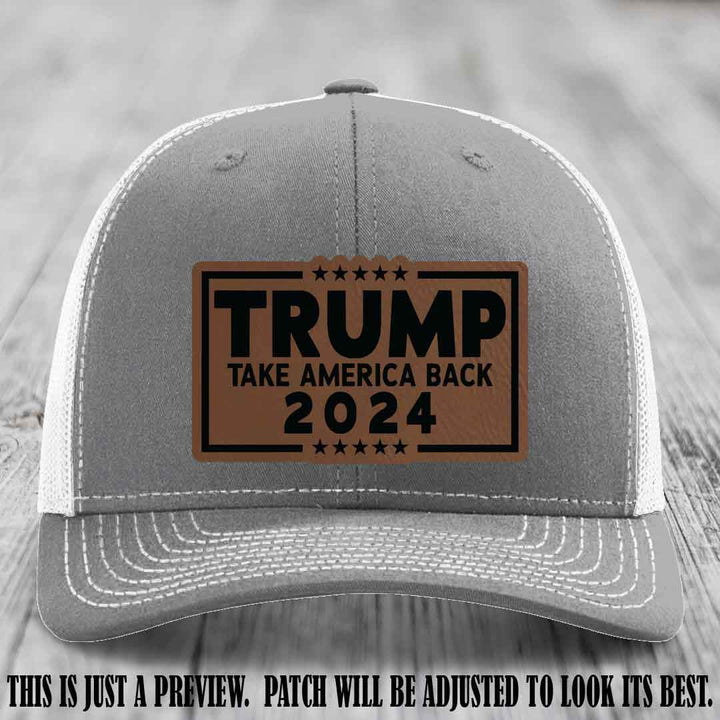 Trump Take America Back 2024 on a Heather Grey to White Hat with Dark Brown to Black Patch