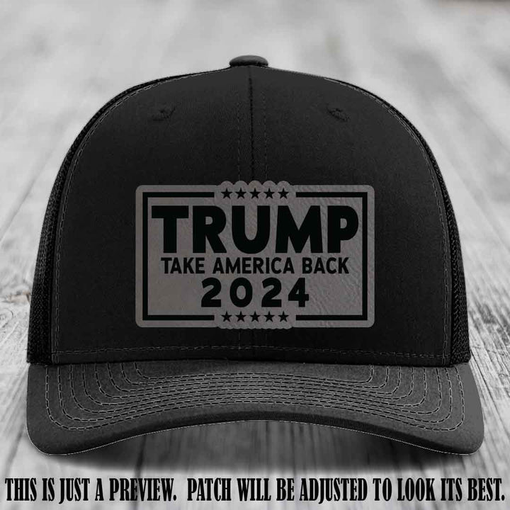 Trump Take America Back 2024 on a Black Hat with Grey to Black Patch