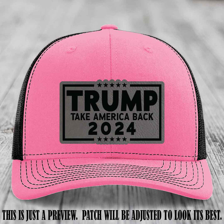 Trump Take America Back 2024 on a Hot Pink to Black Hat with Grey to Black Patch