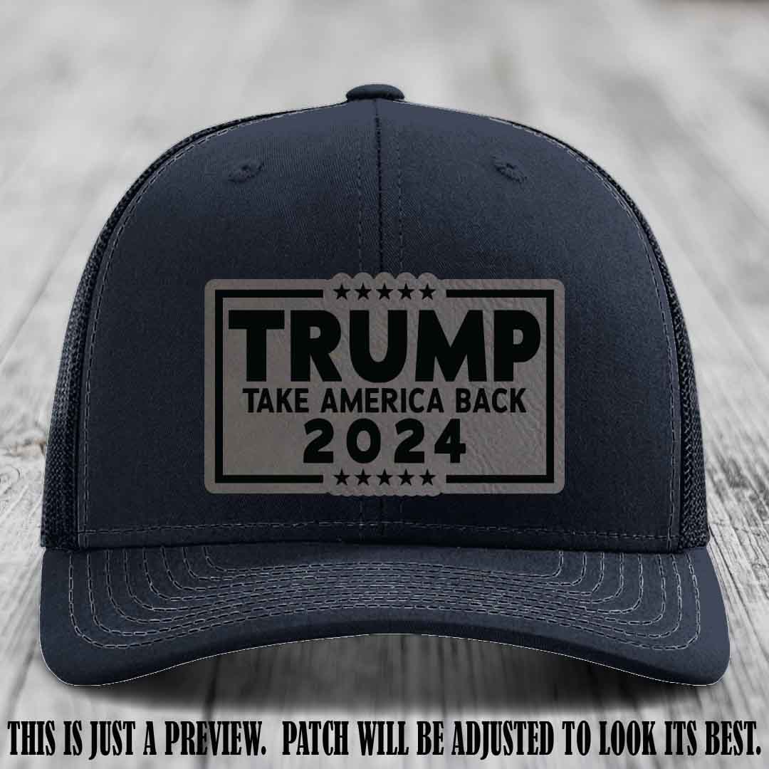 Trump Take America Back 2024 on a Navy Hat with Grey to Black Patch