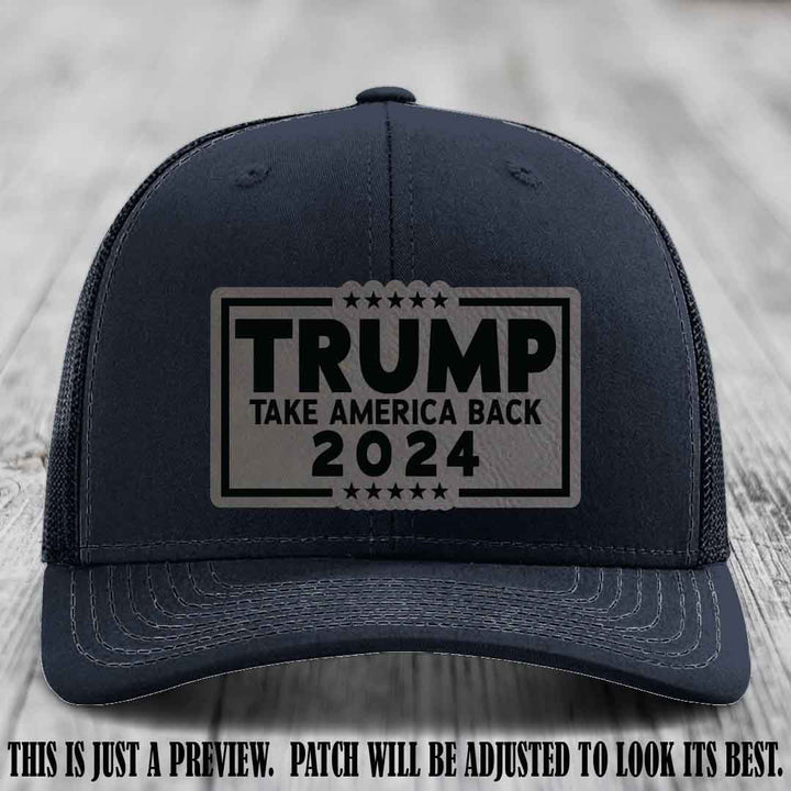 Trump Take America Back 2024 on a Navy Hat with Grey to Black Patch