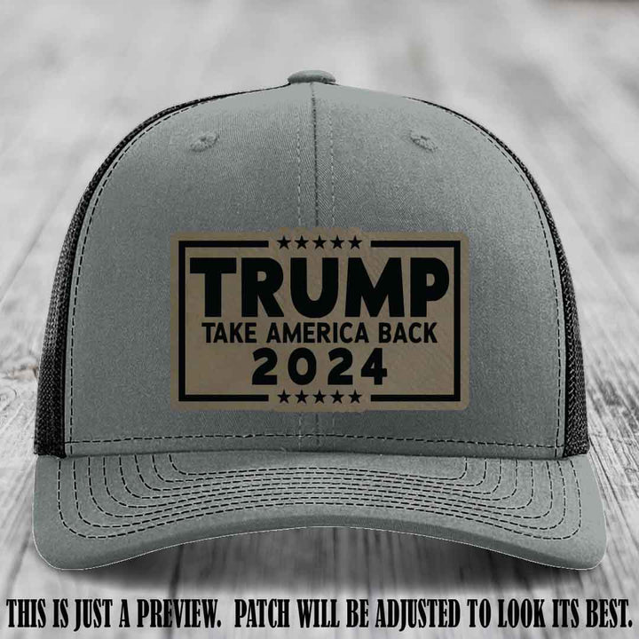 Trump Take America Back 2024 on a Heather Grey to Black Hat with Light Brown to Black Patch