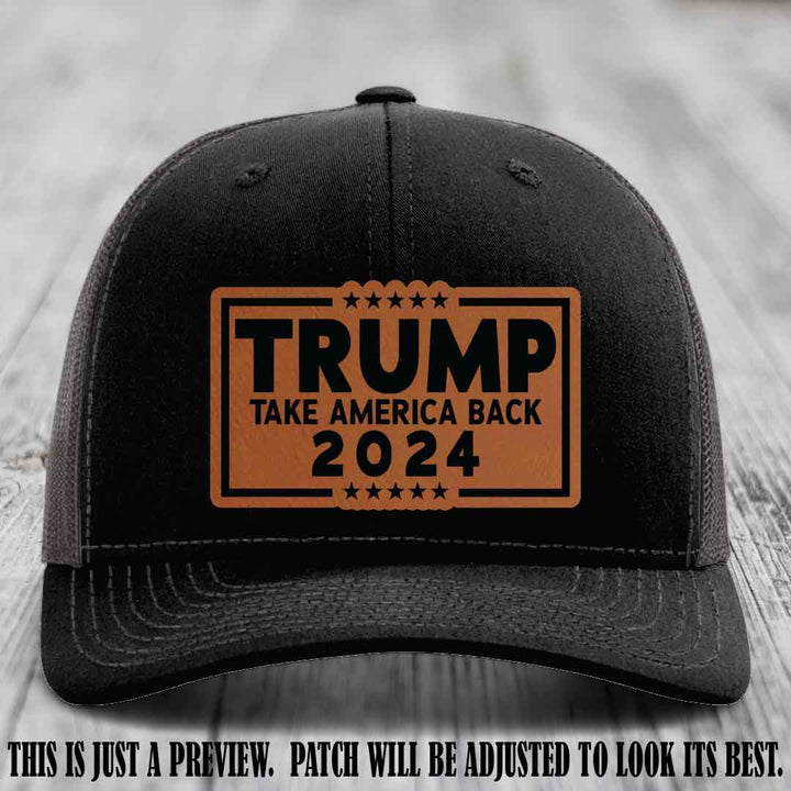 Trump Take America Back 2024 on a Black to Charcoal Hat with Rawhide to Black Patch