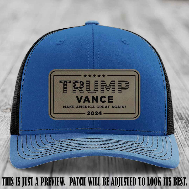 TRUMP VANCE 2024 patch on Light Brown to Black Patch shown on Royal to Black Hat Richardson 112 hat