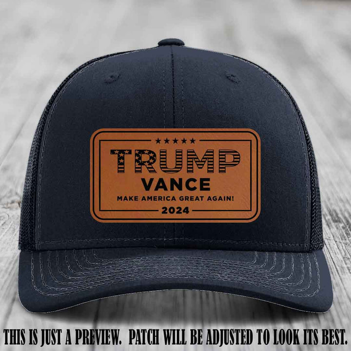 TRUMP VANCE 2024 patch on Rawhide to Black Patch shown on Navy Hat Richardson 112 hat