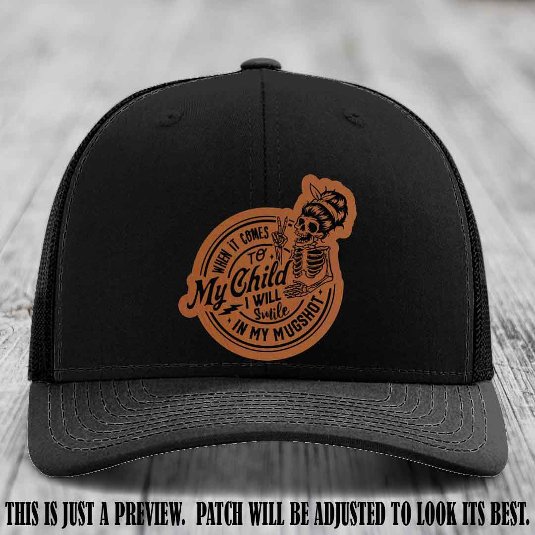 Richardson 112 custom trucker hat with rawhide to black patch and 'My Child Mugshot' leather patch on black hat