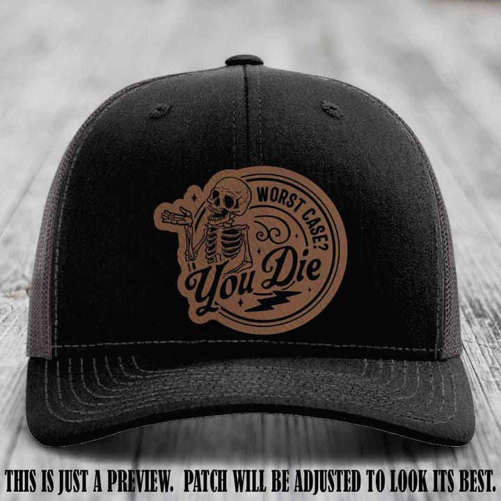 Richardson 112 Black to Charcoal Hat with Dark Brown to Black Patch featuring skeleton and phrase 'Worst Case? You Die'