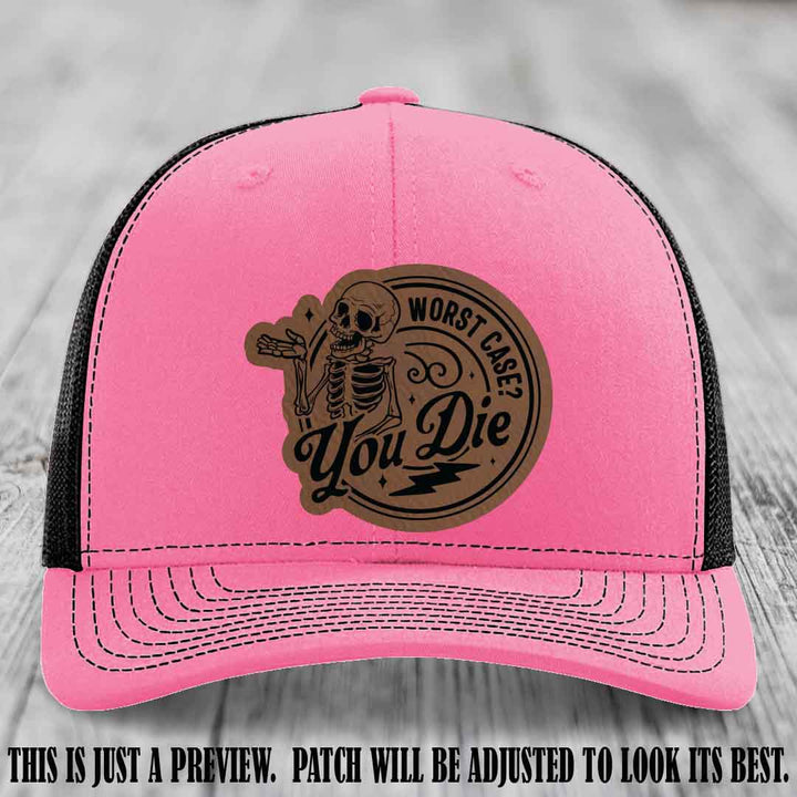 Richardson 112 Hot Pink to Black Hat with Dark Brown to Black Patch featuring skeleton and phrase 'Worst Case? You Die'