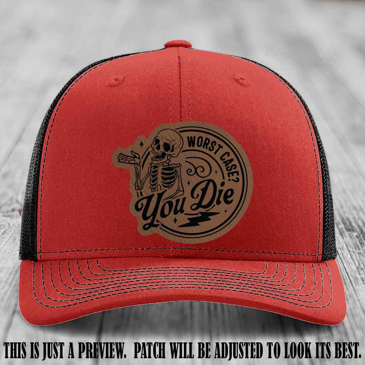 Richardson 112 Red to Black Hat with Dark Brown to Black Patch featuring skeleton and phrase 'Worst Case? You Die'