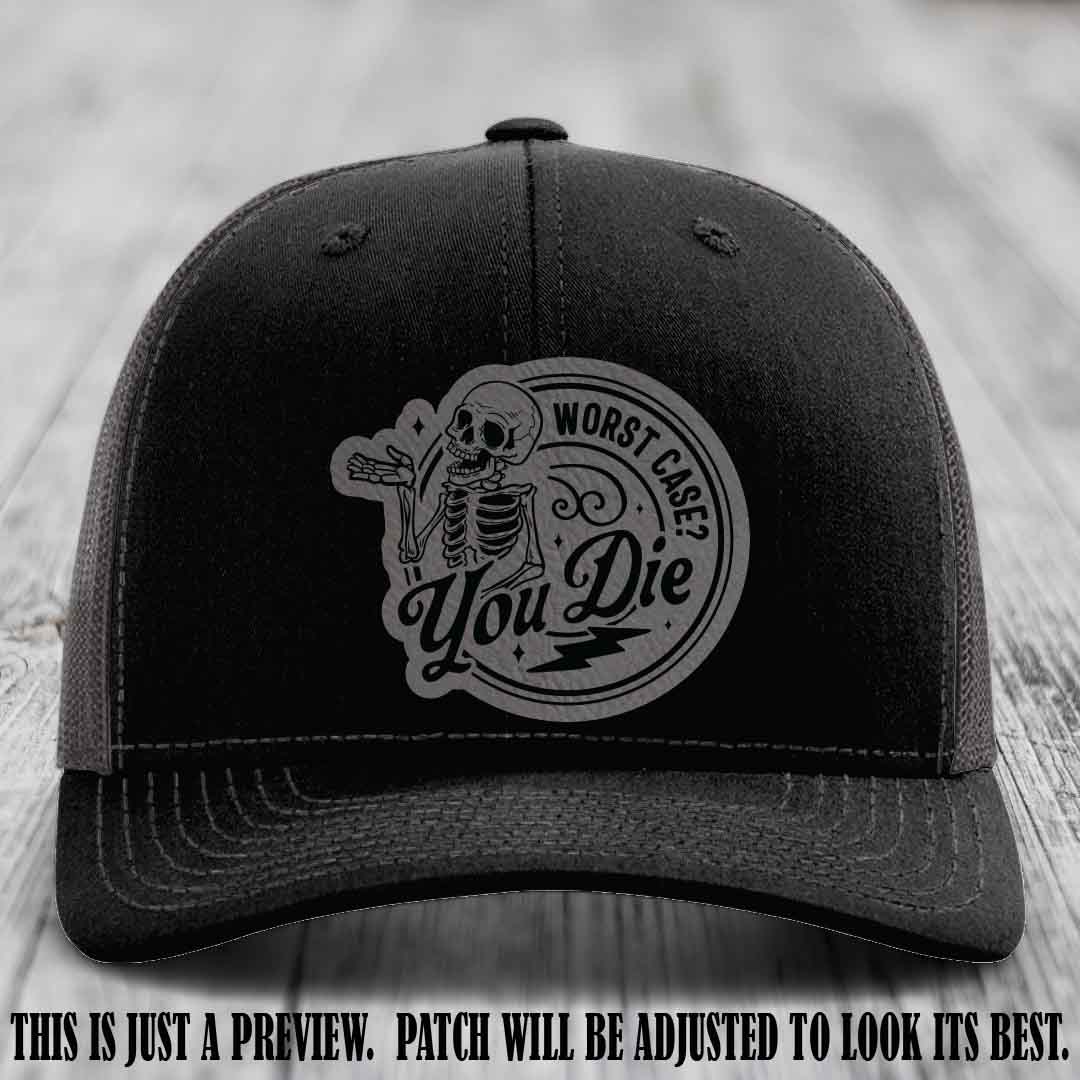 Richardson 112 Black to Charcoal Hat with Grey to Black Patch featuring skeleton and phrase 'Worst Case? You Die'