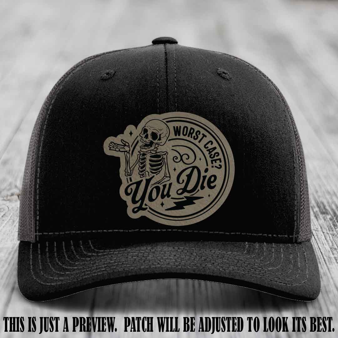 Richardson 112 Black to Charcoal Hat with Light Brown to Black Patch featuring skeleton and phrase 'Worst Case? You Die'