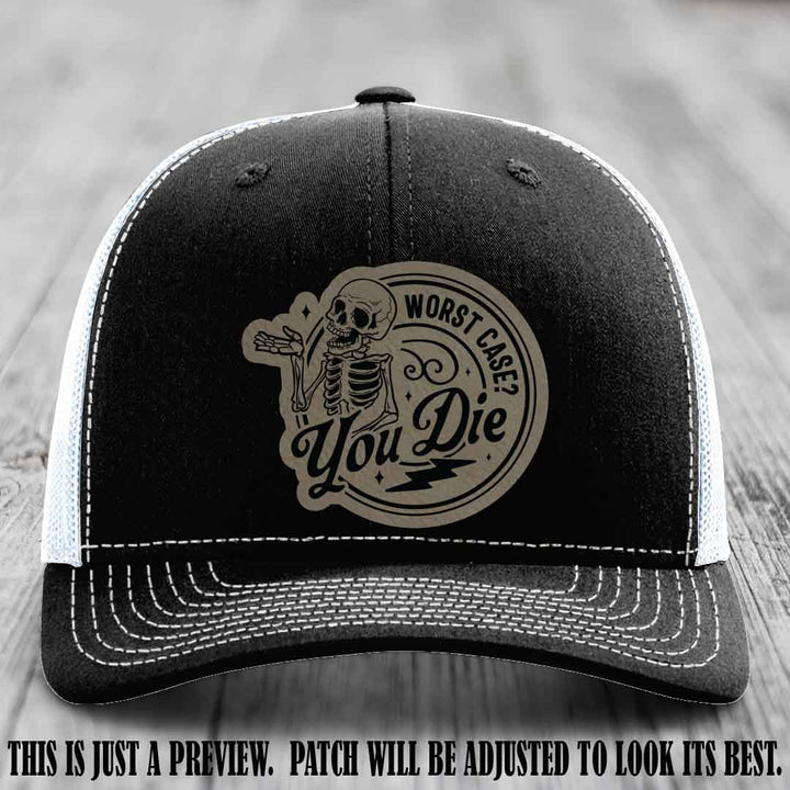Richardson 112 Black to White Hat with Light Brown to Black Patch featuring skeleton and phrase 'Worst Case? You Die'